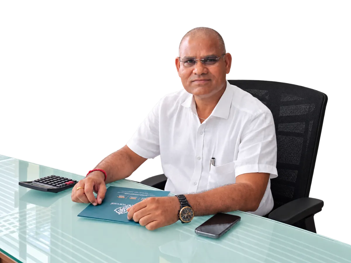 Ar. K. P. Sahu at his desk in the studio